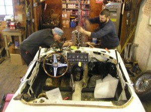 Patrick & Butch haul out the E-type engine by the "up & out" method