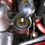 A "H" type carb float sinking in the float chamber
