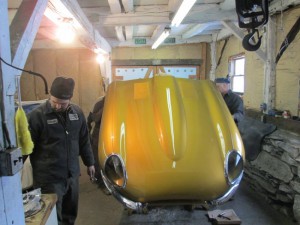 Reassembling the bonnet to the gold E-type