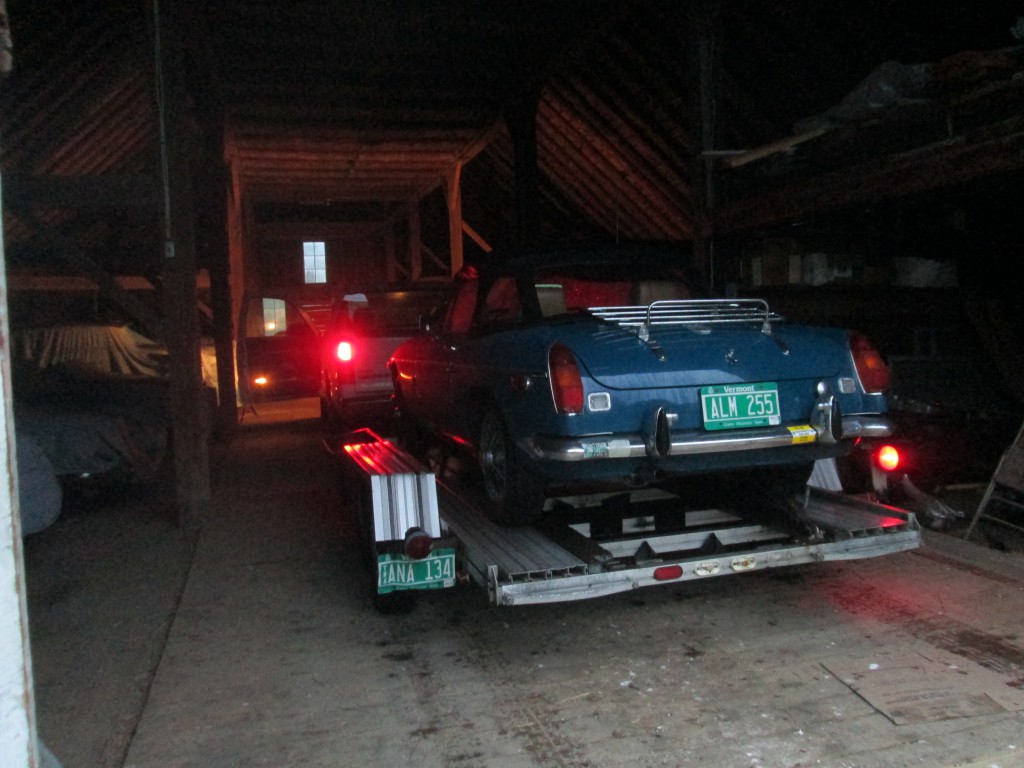 MGB out of the rain in the barn