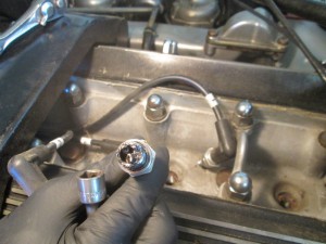 A spark plug needing replacement