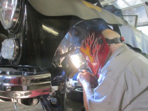 Butch welds a spring tower